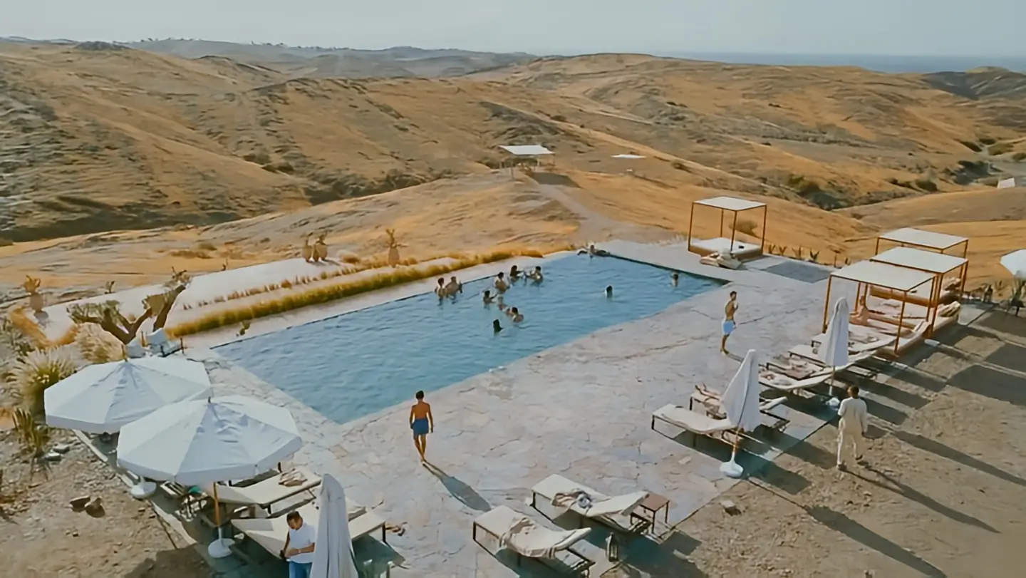 Swimming pool at The White Camel during an Agafay Desert day trip in Morocco